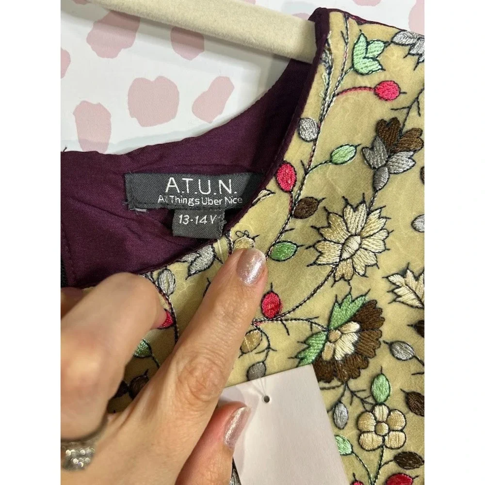 A.T.U.N. All Things Uber Nice sleeveless party